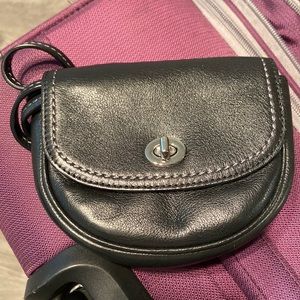 A Coach tiny crossbody bag